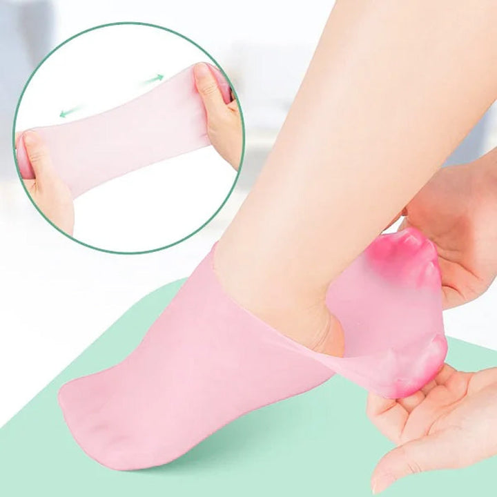 Kvinde silikonesokker med fugtgivende gel, lyserød, blød og fleksibel til spa-pedicure til hjemmebrug.