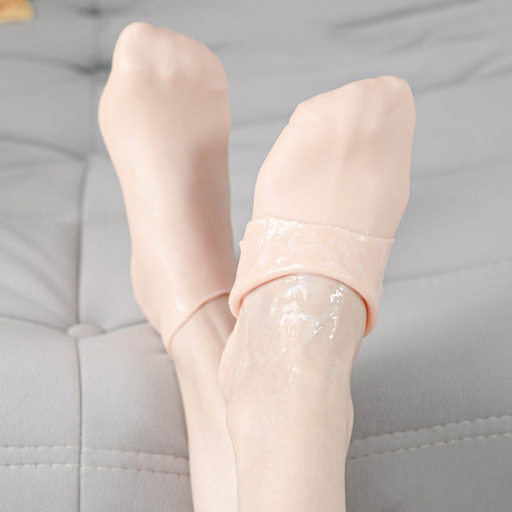 Kvinde silikonesokker med fugtgivende gel, lyserød, blød og fleksibel til spa-pedicure til hjemmebrug.