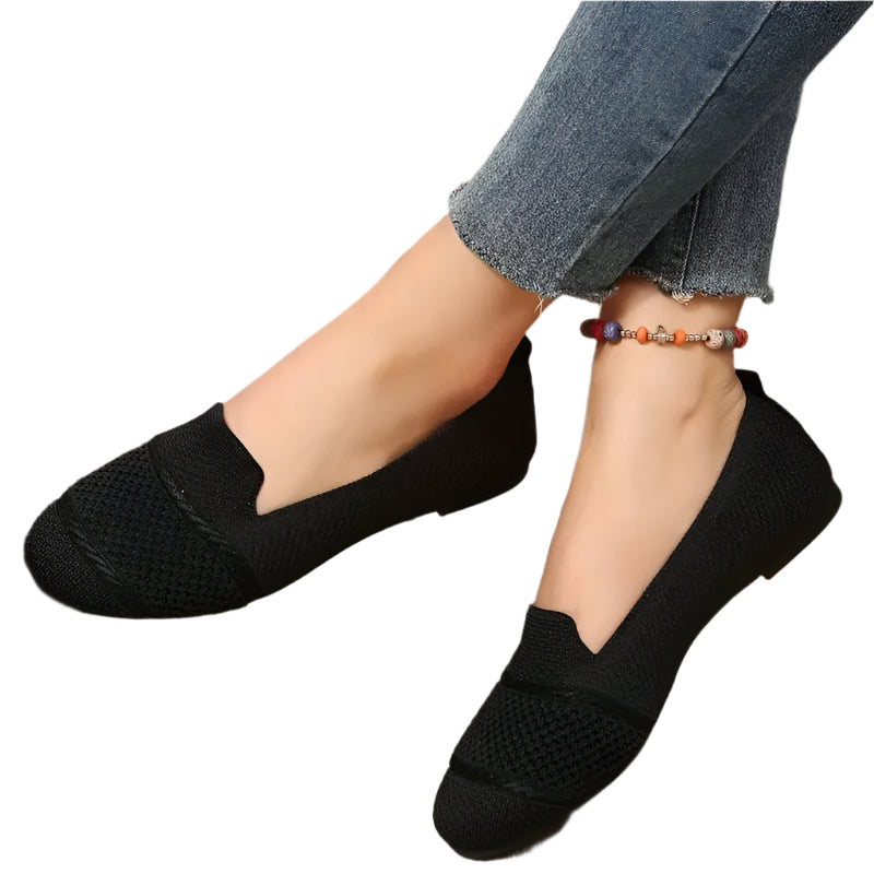 Dame slip-on sko sort og lysebrun, elegant og komfortabel til efteråret, lavet af højkvalitets tekstil.