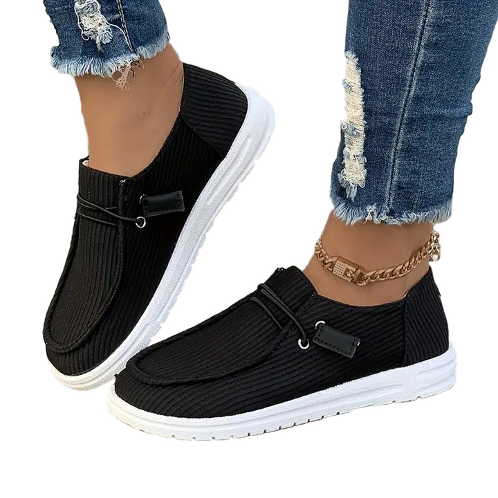 Dame slip-on fritidssko, behagelig pasform, tidløst design, holdbart materiale, nem at bruge og stilfuld.