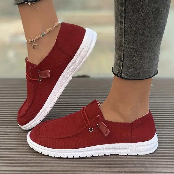 Dame slip-on fritidssko, behagelig pasform, tidløst design, holdbart materiale, nem at bruge og stilfuld.