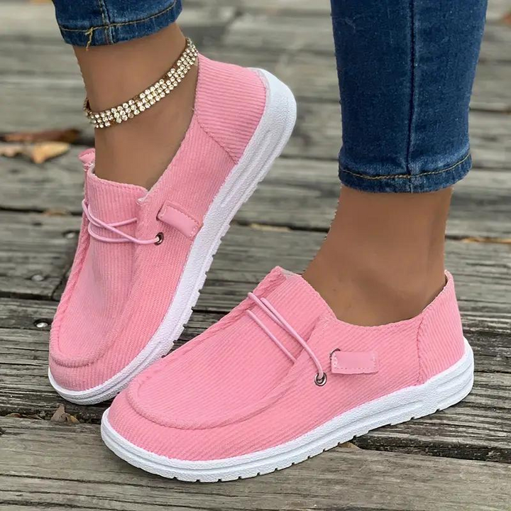 Dame slip-on fritidssko, behagelig pasform, tidløst design, holdbart materiale, nem at bruge og stilfuld.