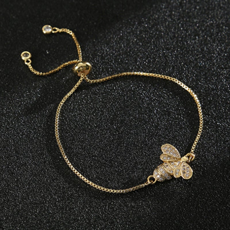 Dame sterling sølv bi armbånd med zirkon, elegant design, reflekterer sollys, justerbar stil.