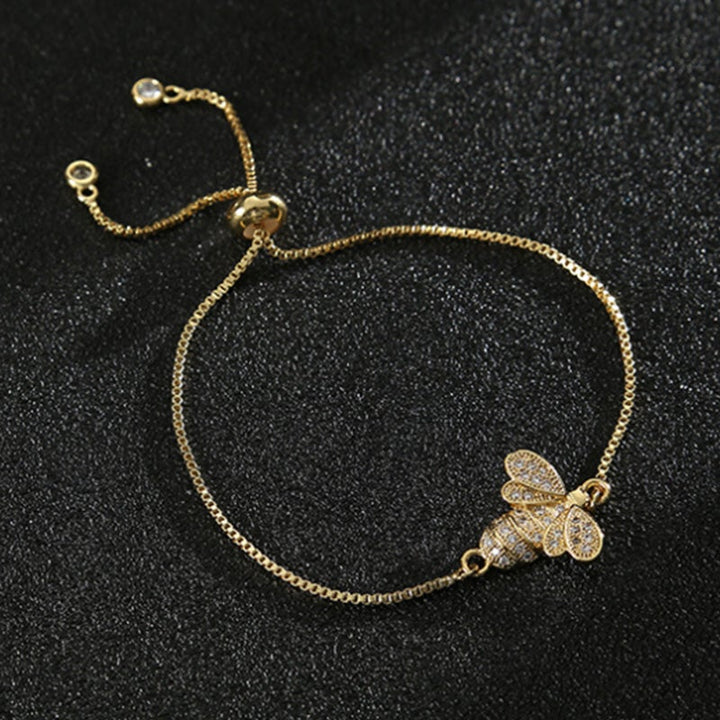 Dame sterling sølv bi armbånd med zirkon, elegant design, reflekterer sollys, justerbar stil.