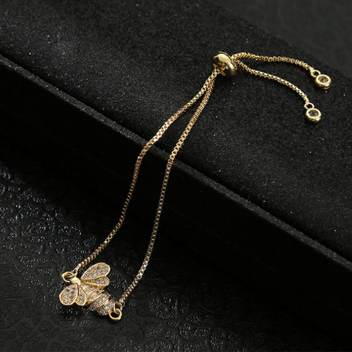 Dame sterling sølv bi armbånd med zirkon, elegant design, reflekterer sollys, justerbar stil.