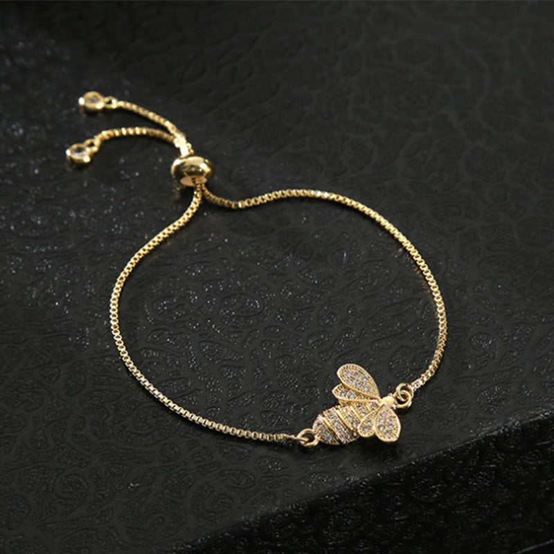 Dame sterling sølv bi armbånd med zirkon, elegant design, reflekterer sollys, justerbar stil.