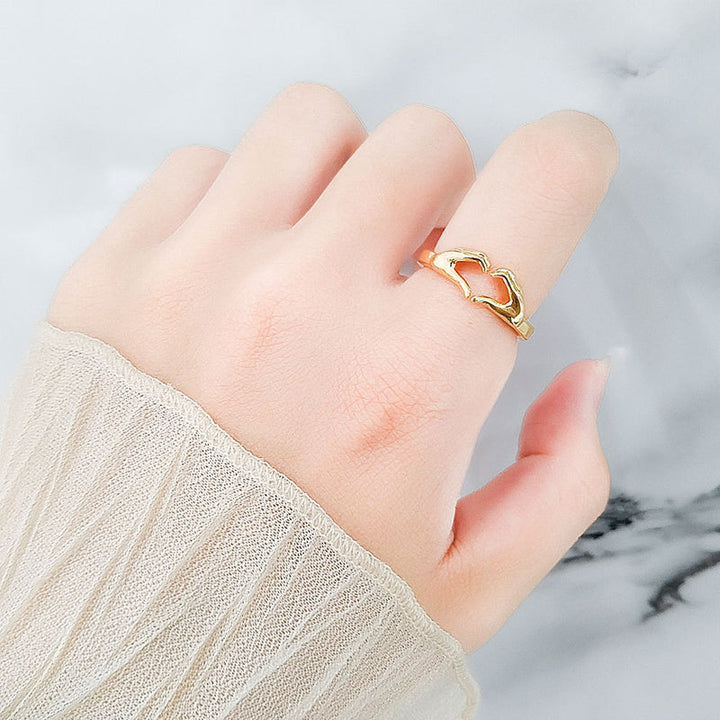 Dame hjerte ring i kobber og guld, hjerteformet, stilfuldt og elegant smykke perfekt som gave.