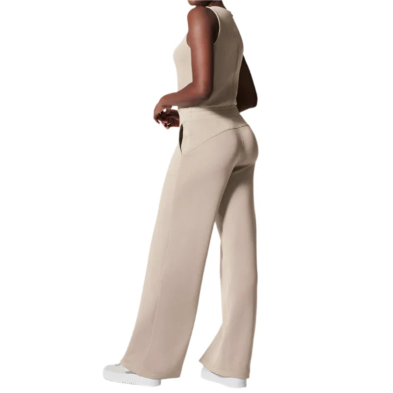 Dame jumpsuit, stilfuldt, blødt stof, lange brede ben, åndbar, alsidigt design, sidder flot.