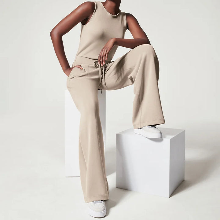 Dame jumpsuit, stilfuldt, blødt stof, lange brede ben, åndbar, alsidigt design, sidder flot.