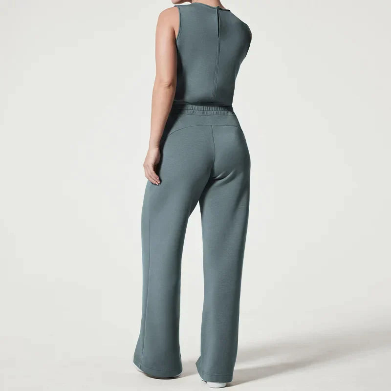 Dame jumpsuit, stilfuldt, blødt stof, lange brede ben, åndbar, alsidigt design, sidder flot.