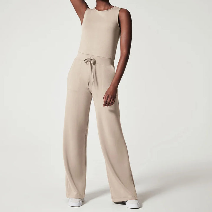 Dame jumpsuit, stilfuldt, blødt stof, lange brede ben, åndbar, alsidigt design, sidder flot.