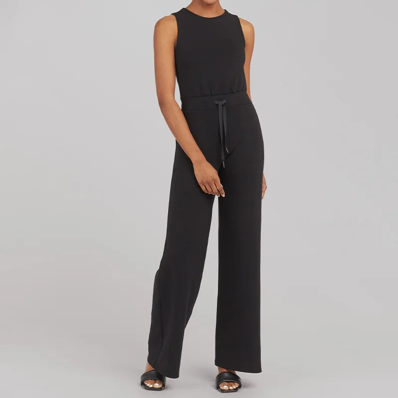 Dame jumpsuit, stilfuldt, blødt stof, lange brede ben, åndbar, alsidigt design, sidder flot.