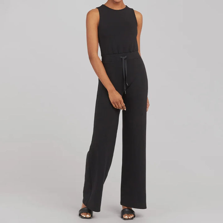Dame jumpsuit, stilfuldt, blødt stof, lange brede ben, åndbar, alsidigt design, sidder flot.