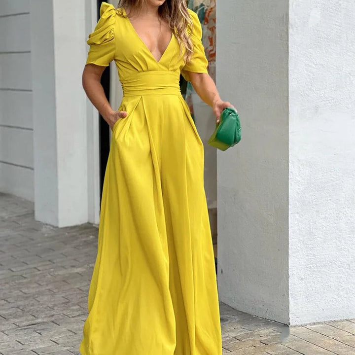 Dame jumpsuit i fersken farve