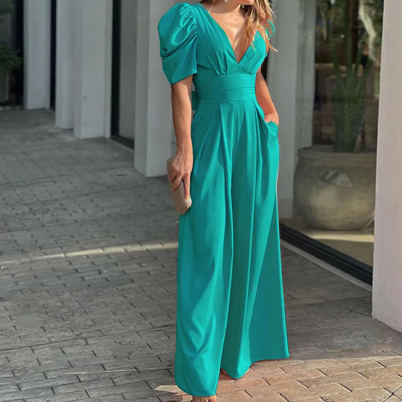 Dame jumpsuit i turkis farve