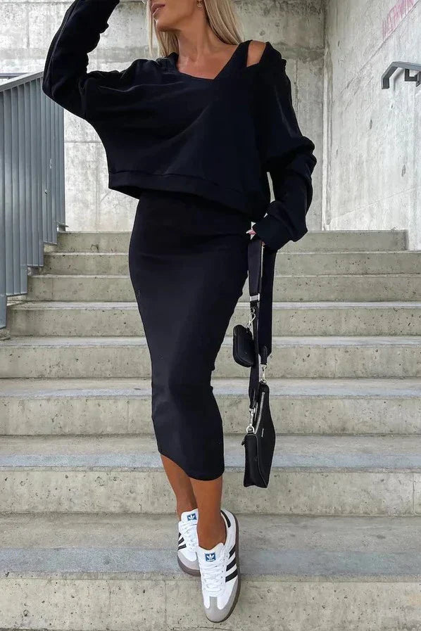 Elegant brun damekjole med tidløst design, perfekt til kontoret eller aftenbrug.