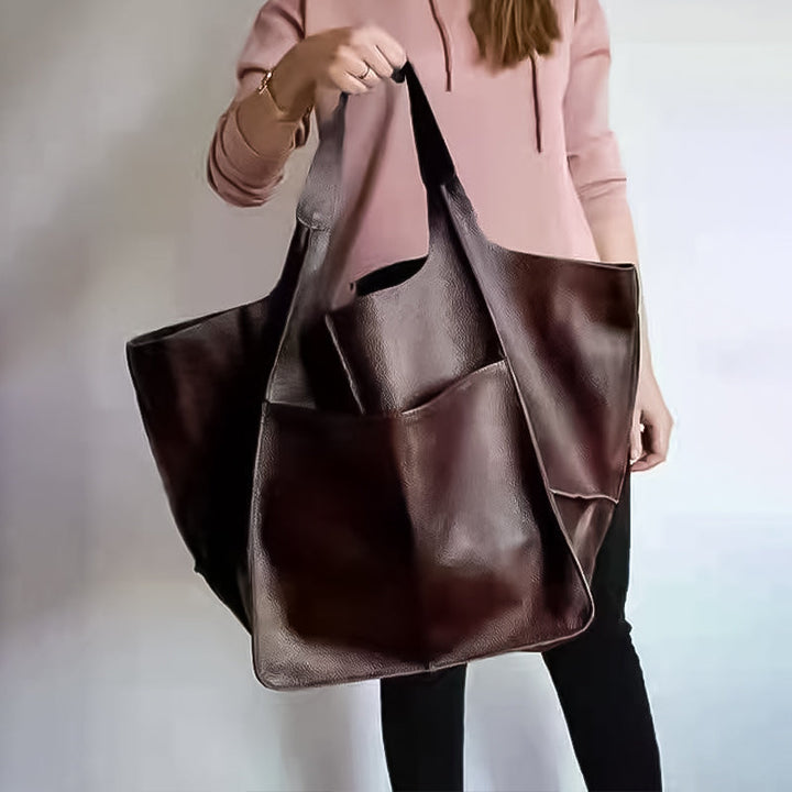 Dame elegant oversize skuldertaske i sort kunstlæder, passer til fest eller hverdag. Elegant tilbehør til damemode.