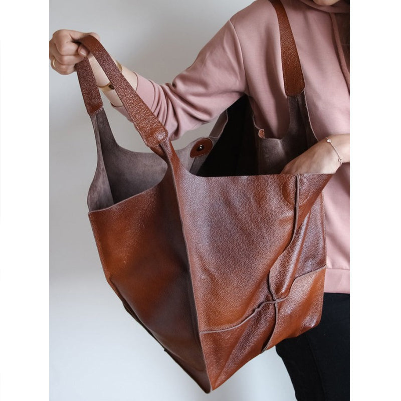Dame elegant oversize skuldertaske i sort kunstlæder, passer til fest eller hverdag. Elegant tilbehør til damemode.