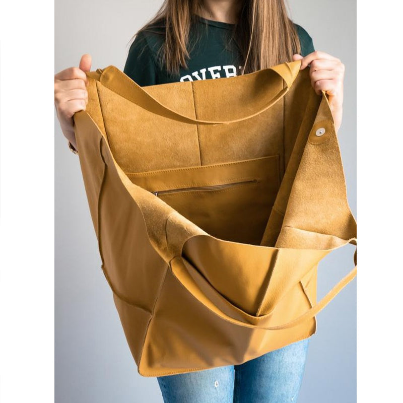 Dame elegant oversize skuldertaske i sort kunstlæder, passer til fest eller hverdag. Elegant tilbehør til damemode.