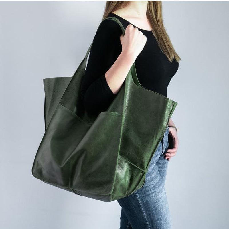 Dame elegant oversize skuldertaske i sort kunstlæder, passer til fest eller hverdag. Elegant tilbehør til damemode.