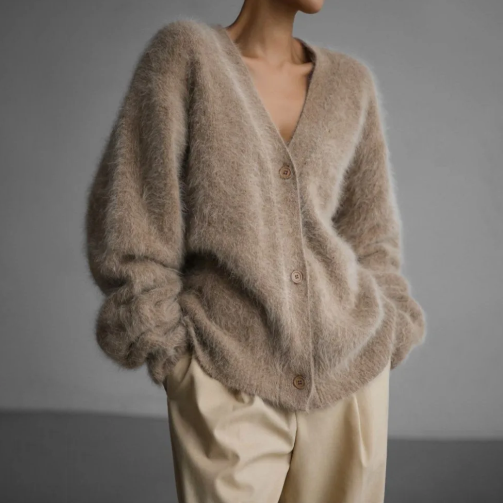 Dame elegant striktrøje, blød og holdbar, i jordnære farver, perfekt til hverdag og fest.