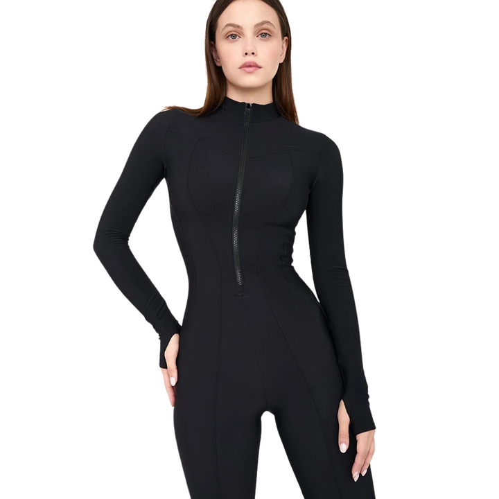 Dame sporty langærmet romper med rund hals og lynlås foran, lavet af åndbart og behageligt materiale.