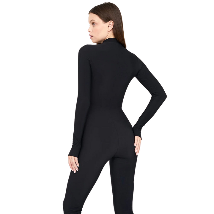 Dame sporty langærmet romper med rund hals og lynlås foran, lavet af åndbart og behageligt materiale.