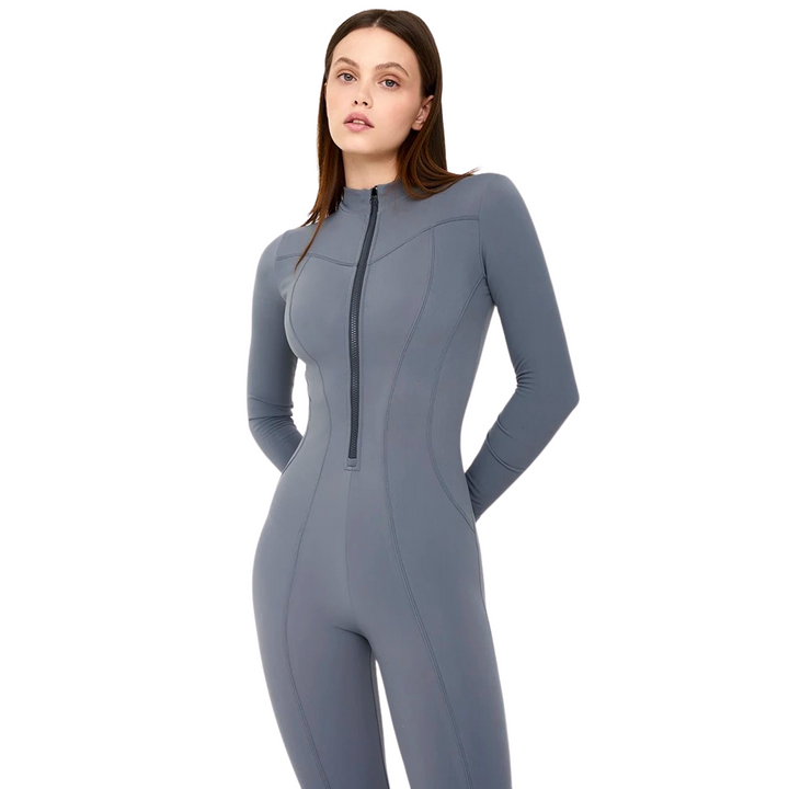 Dame sporty langærmet romper med rund hals og lynlås foran, lavet af åndbart og behageligt materiale.