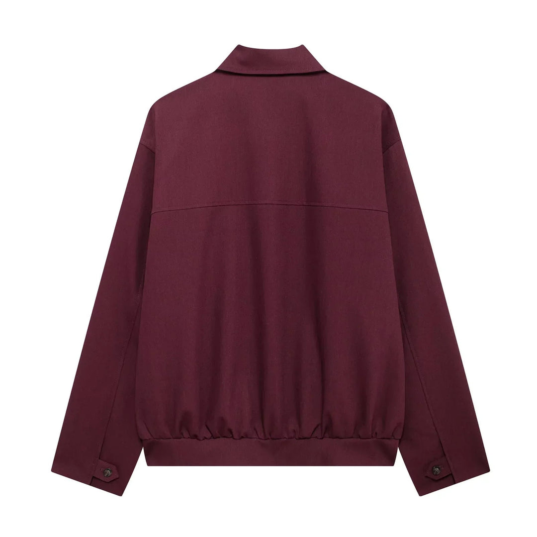 Naisten viininpunainen bomber-takki, moderni leikkaus, lyhyt pituus, pitkät hihat, elegantti ja trendikäs look.