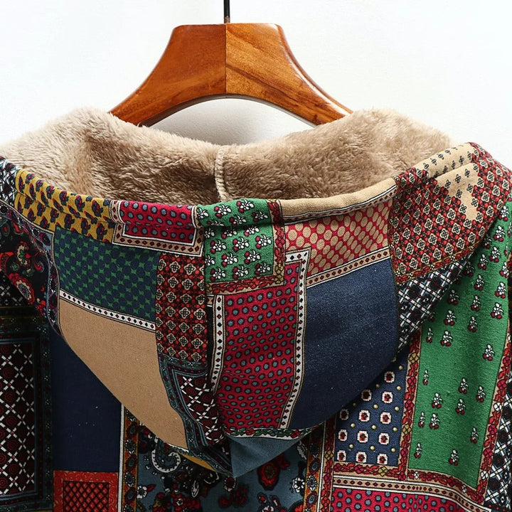 "Naisten vintage-hupullinen pitkä fleecetakki, romanttinen kuosi, tilava huppu, lämpimän hämärän ruskea sävy."