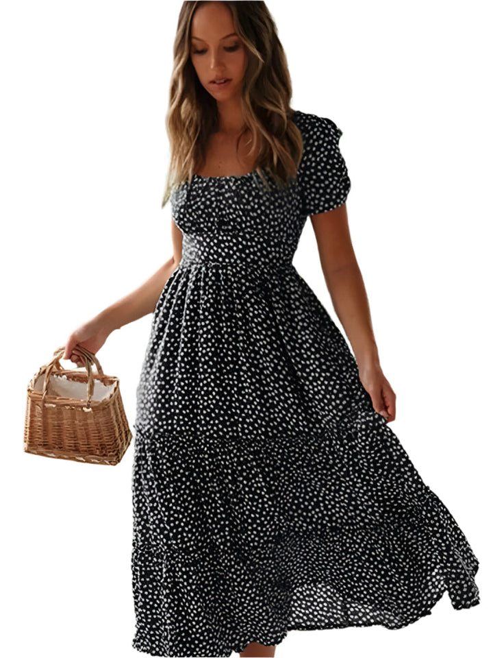 Dame vintage-stil maxi kjole med pufærmer og blomstertryk, firkantet halsudskæring, sommerlig elegance.