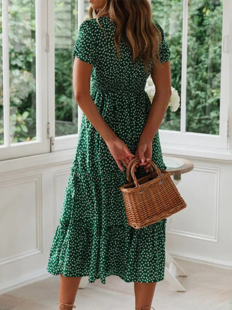 Dame vintage-stil maxi kjole med pufærmer og blomstertryk, firkantet halsudskæring, sommerlig elegance.