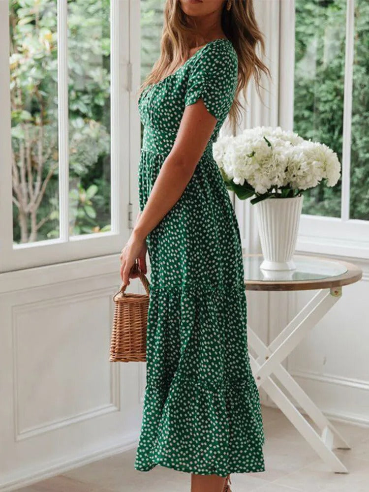Dame vintage-stil maxi kjole med pufærmer og blomstertryk, firkantet halsudskæring, sommerlig elegance.