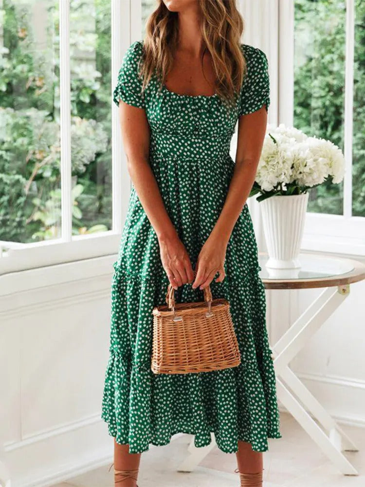 Dame vintage-stil maxi kjole med pufærmer og blomstertryk, firkantet halsudskæring, sommerlig elegance.