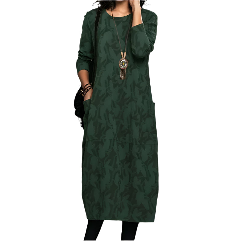 Dame vintage-stil kjole i grøn, behagelig og alsidig, med dekorative detaljer set forfra.