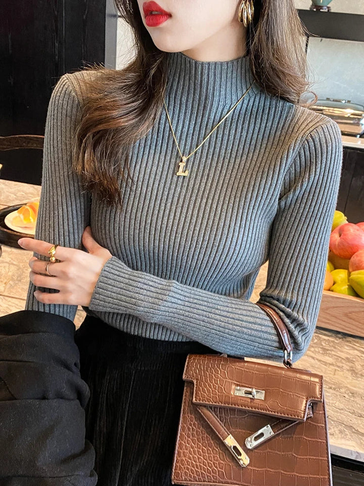 Dame ensfarvet langærmet turtleneck strik, blødt og behageligt materiale giver stil og varme.