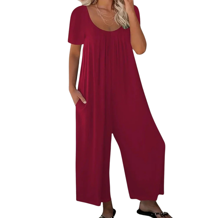 Dame ensfarvet rund hals jumpsuit, sommer, bred ben, korte ærmer, sidelommer, let stof.