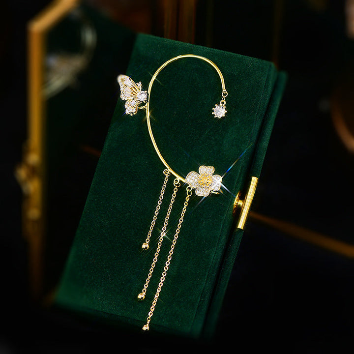 Damer zirkonia sommerfugl øreringe, guld og sølv, klare zirkonia-sten, elegant design, blomster- og sommerfuglmønster.