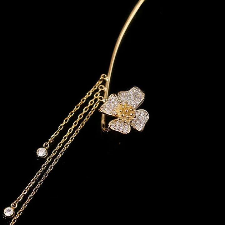 Damer zirkonia sommerfugl øreringe, guld og sølv, klare zirkonia-sten, elegant design, blomster- og sommerfuglmønster.