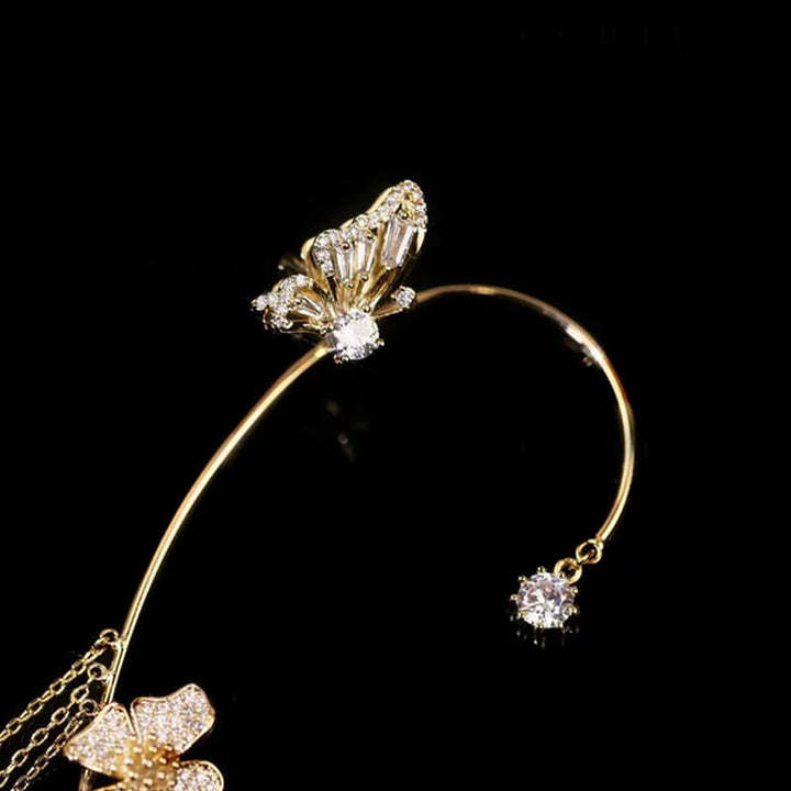Damer zirkonia sommerfugl øreringe, guld og sølv, klare zirkonia-sten, elegant design, blomster- og sommerfuglmønster.