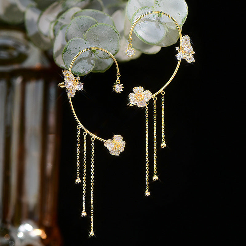 Damer zirkonia sommerfugl øreringe, guld og sølv, klare zirkonia-sten, elegant design, blomster- og sommerfuglmønster.