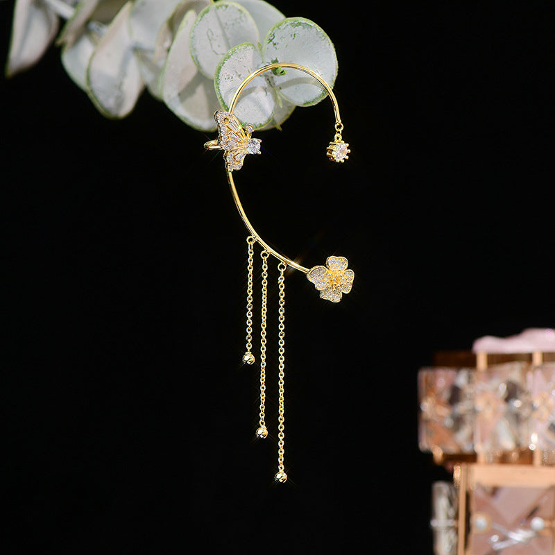 Damer zirkonia sommerfugl øreringe, guld og sølv, klare zirkonia-sten, elegant design, blomster- og sommerfuglmønster.