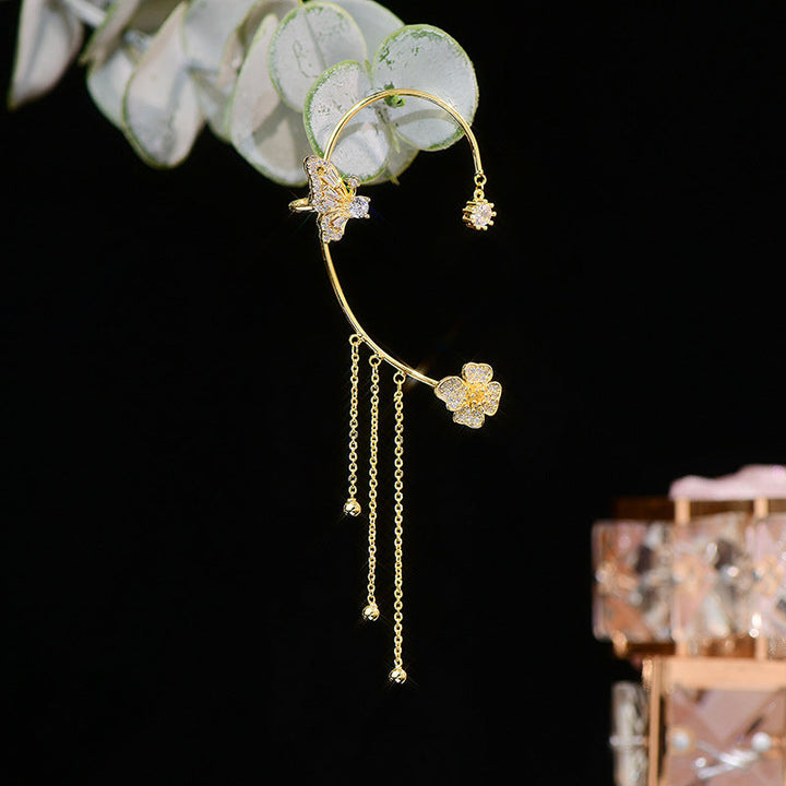 Damer zirkonia sommerfugl øreringe, guld og sølv, klare zirkonia-sten, elegant design, blomster- og sommerfuglmønster.