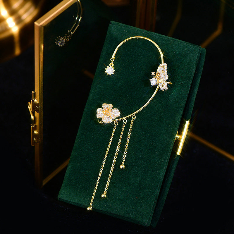 Damer zirkonia sommerfugl øreringe, guld og sølv, klare zirkonia-sten, elegant design, blomster- og sommerfuglmønster.