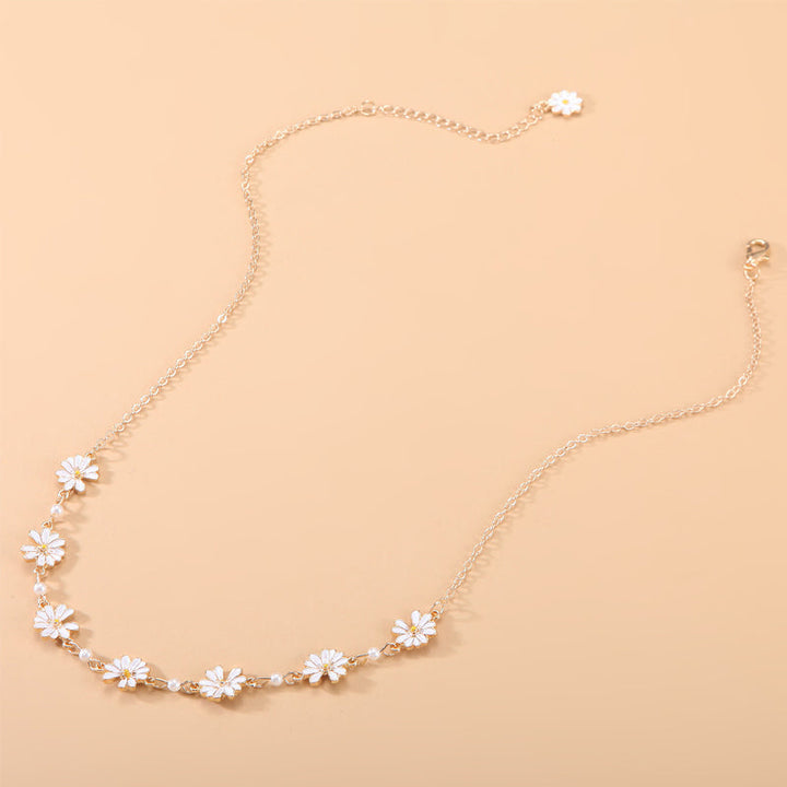 Marguerit armbånd til sommerstil, hvidt marguerit motiv i metallegering, friskt og holdbart smykke.