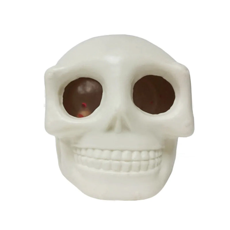 Sjov dødningehoved stressbold til Halloween, grå og hvid, med udstående øjne, perfekt til stresslindring.