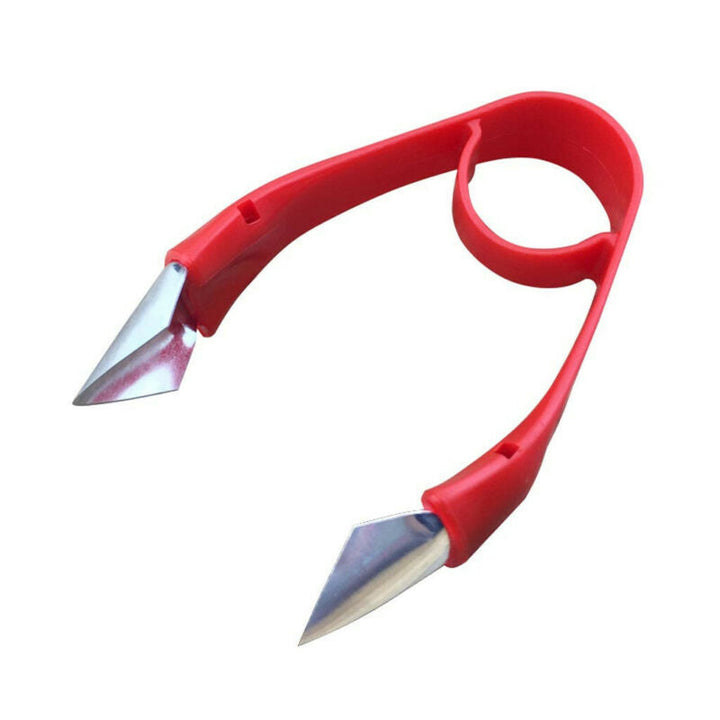 Rød frugtkernerudstikker med ergonomisk greb, skarp rustfri stålklinge, letter håndteringen af jordbær og tomater