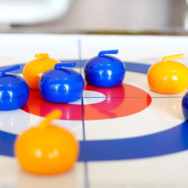 Bordcurling spil billede, realistisk is-effekt, kompakt design, blå og gule sten, indendørs underholdning for familier.