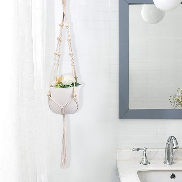 Hængende nettaske til blomsterpotter, moderne boho-stil, beige bomuldssnor, til indendørs og udendørs brug, detaljer.