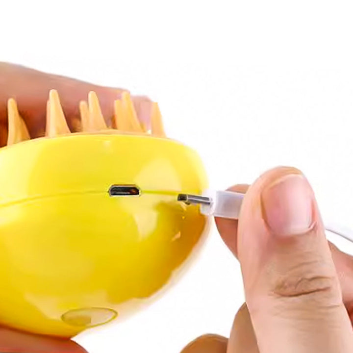 Sprøjtsikker kæledyrskam til katte med dampfunktion, ergonomisk design, gul, til pelspleje.